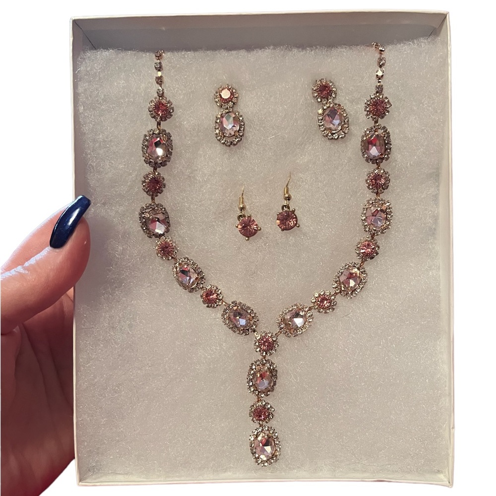 Costume jewelry from local boutique, includes necklace & two pairs of earrings